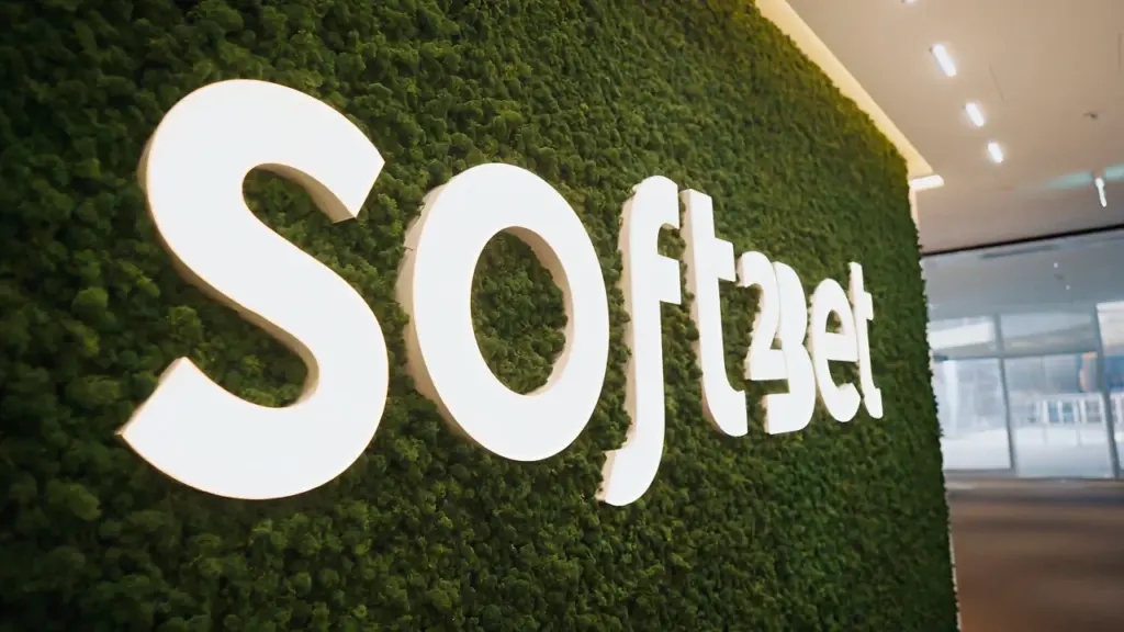 Logo Soft2Bet sur fond vert représentant l'identité visuelle de la marque au Canada