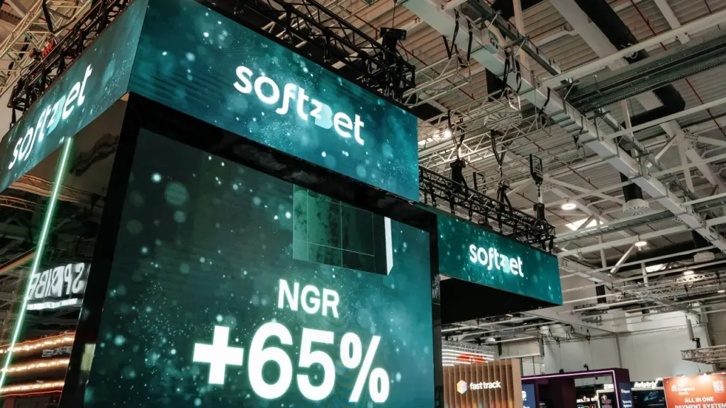 Stand d'exposition Soft2Bet avec visiteurs et présentations au Canada